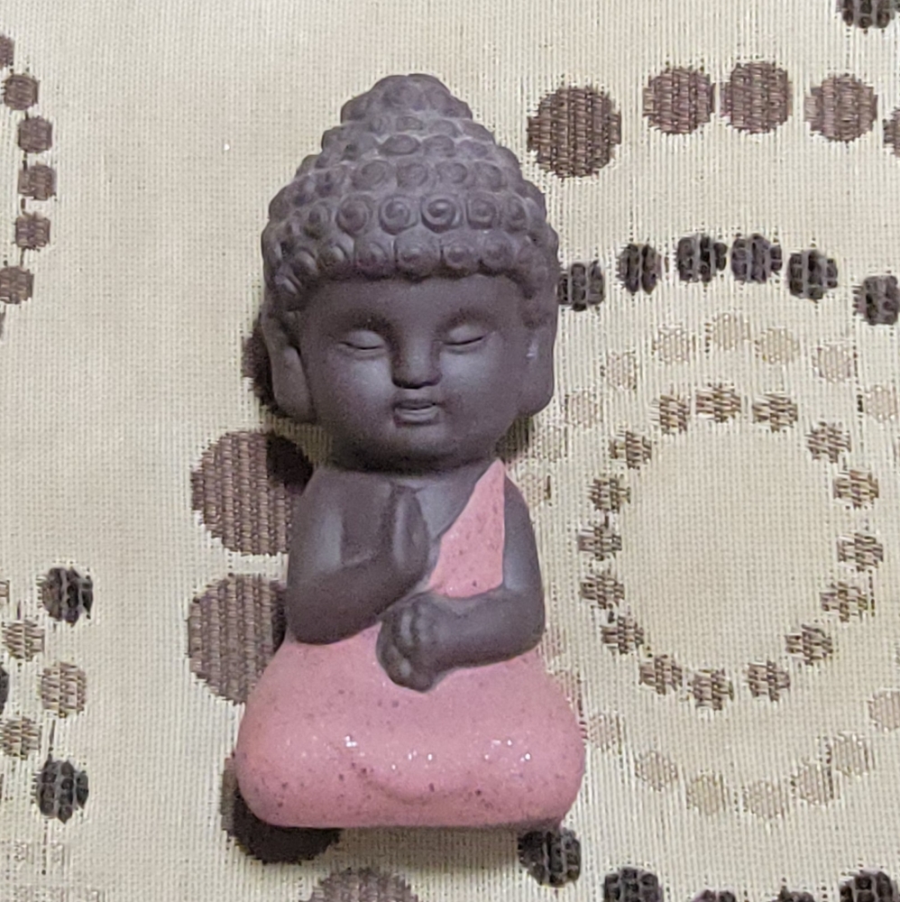 Mini Ceramic Buddha Monk Wisperer Pink Sitting Statue